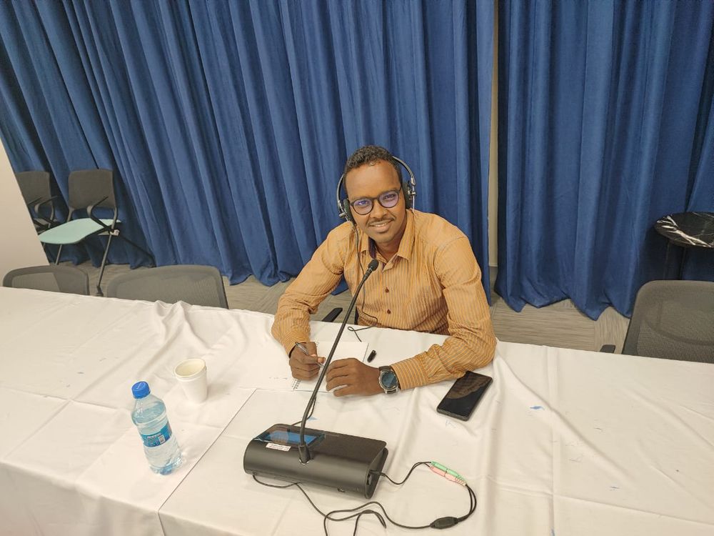 A Danjire interpreter at work during a conference assignment